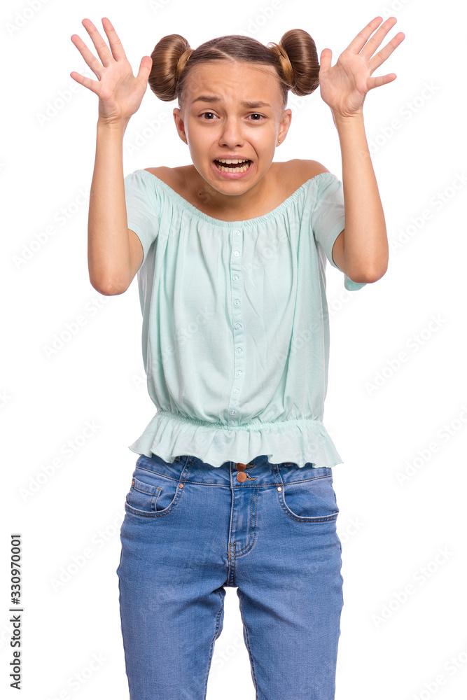 Portrait of surprised or shocked teen girl, isolated on white background. Scared child looking at camera in amazement. Upset caucasian teenager with raised hands. Portrait of surprised or shocked teen girl, isolated on white background. Scared child looking at camera in amazement. Upset caucasian teenager with raised hands.