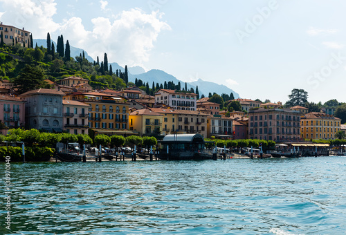 Fototapeta Naklejka Na Ścianę i Meble -  View from Lake Como to the city of Bellagio on a sunny day. Northern Italy