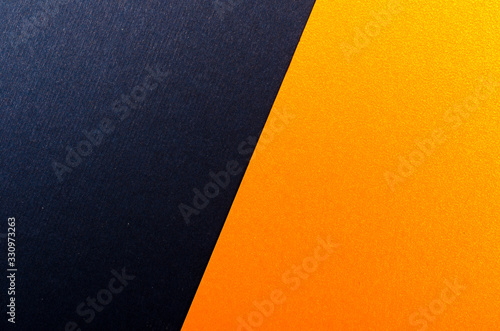 Blue and orange paper texture background. Place for text. Two tones. Background for presentation.