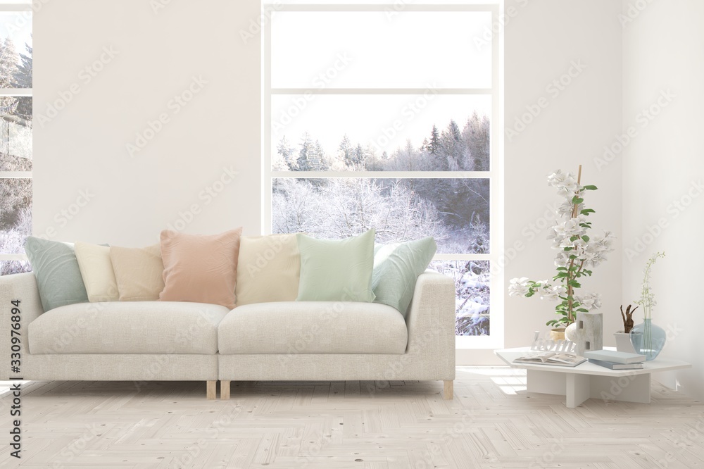 Modern living room in white color with sofa and winter landscape in window. Scandinavian interior design. 3D illustration Modern living room in white color with sofa and winter landscape in window. Scandinavian interior design. 3D illustration