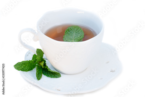 MInt tea in a white cup
