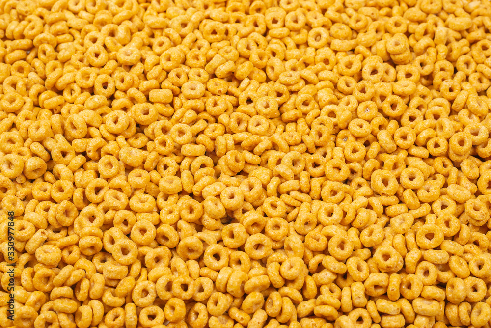 Corn-flakes background and texture. Top view. Corn-flakes background and texture. Top view.