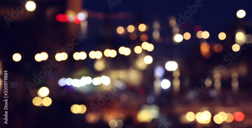 abstract background of colorful blurred defocused bokeh street lights. motion and nightlife concept © tomertu