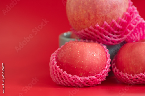 Apple wrapped with foam fruit net