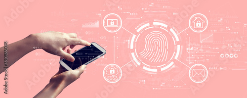 Fingerprint scanning theme with person holding a white smartphone