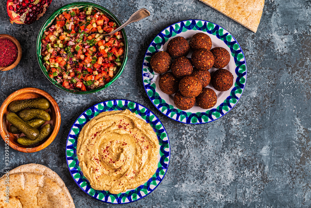 Falafel and hummus- traditional dish of Israeli and Middle Eastern cuisine