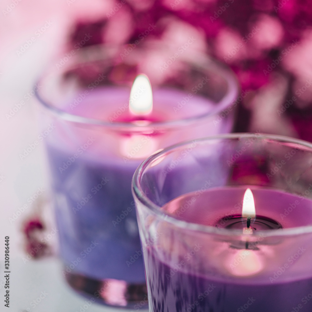 Aromatic Rose and Blue Scented Candles with Pink Dried Flowers Decoration - obrazy, fototapety, plakaty 