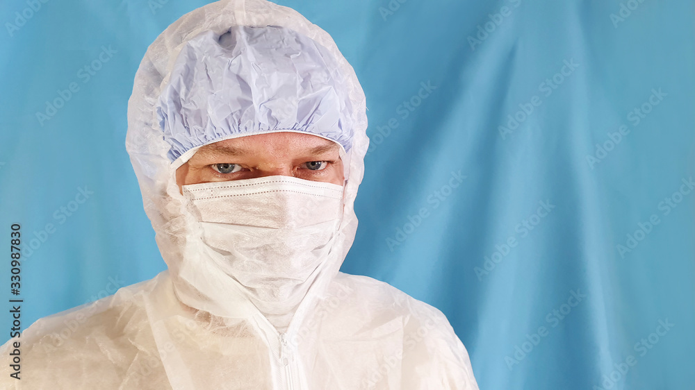 male doctor in mask and protective suit male doctor in mask and protective suit