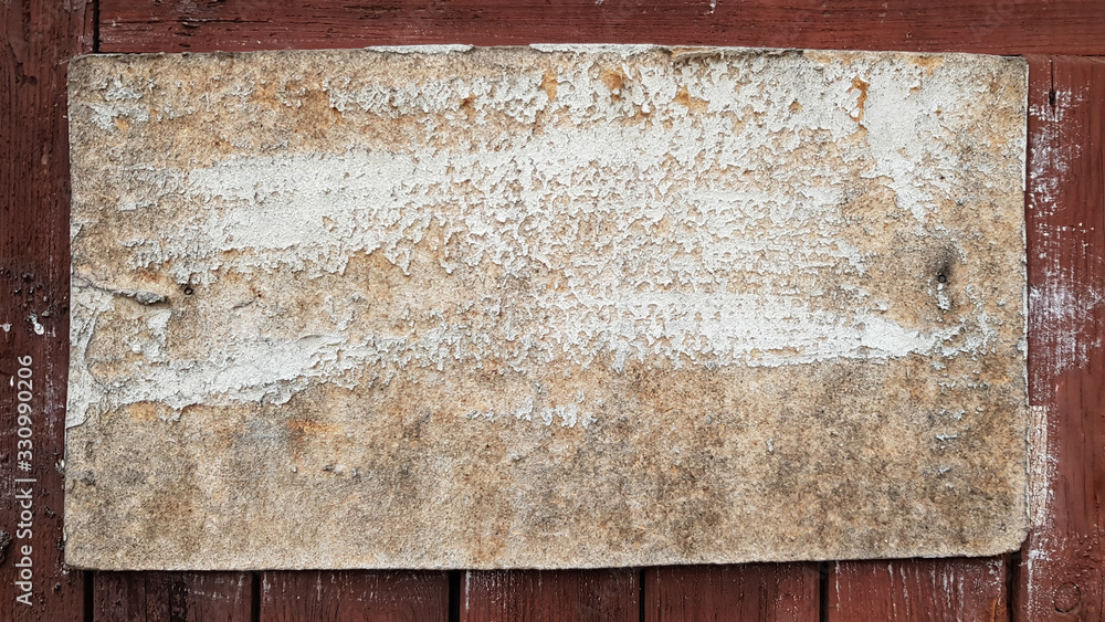 A rustic wooden sign on a weathered board attached to a wooden fence. vintage frames on old wooden wall. Gray wood background texture with copy space. wall wooden table. A rustic wooden sign on a weathered board attached to a wooden fence. vintage frames on old wooden wall. Gray wood background texture with copy space. wall wooden table.
