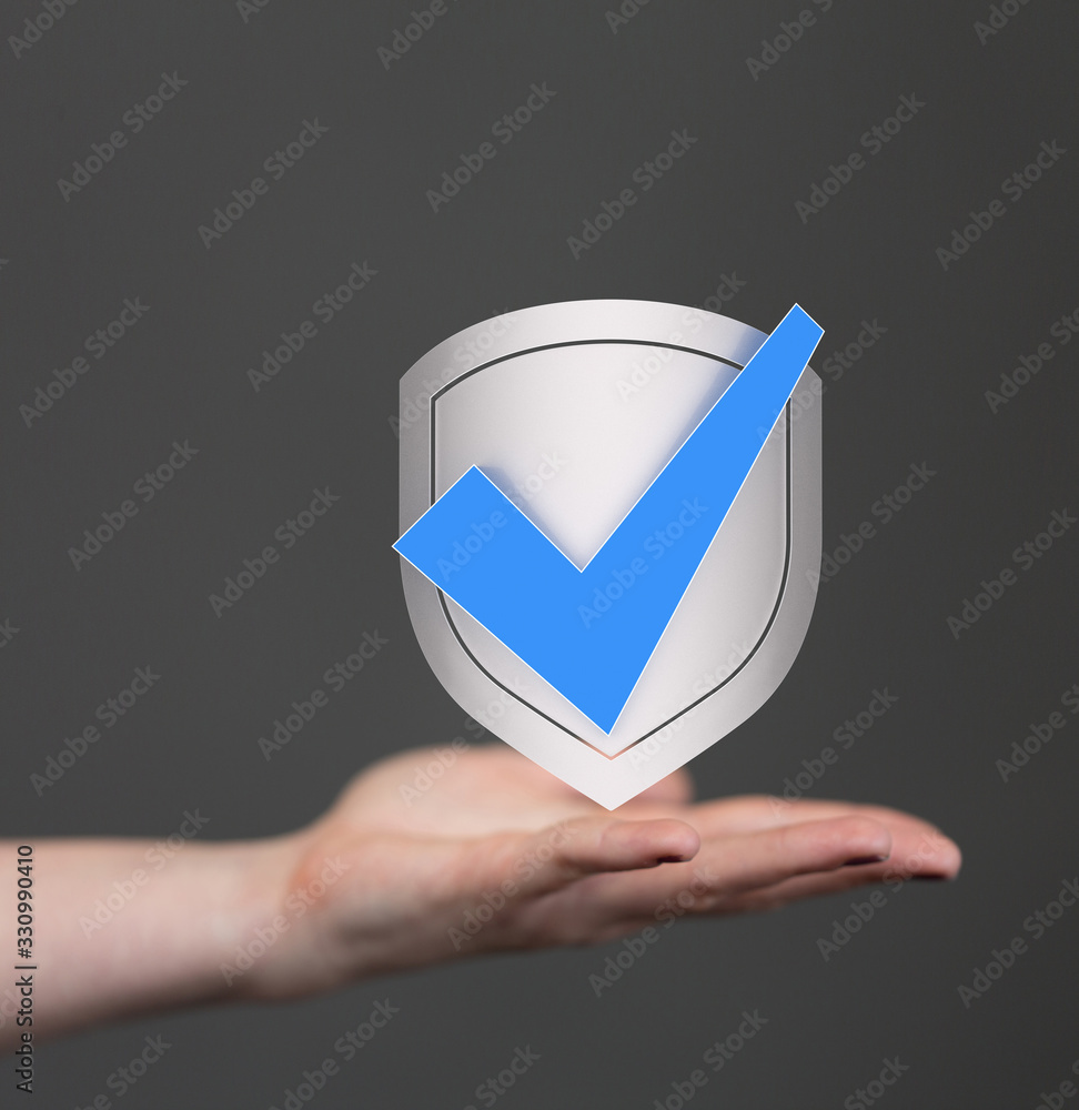 shield protection concept holding in hand shield protection concept holding in hand