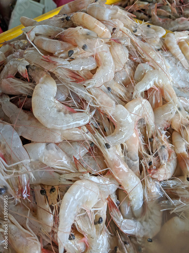 basket full of fresh shrimps to sale at wet market