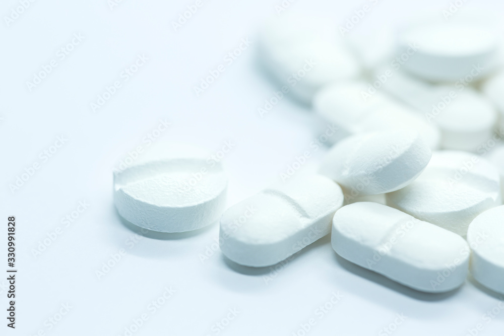 prescription pills on white background closeup prescription pills on white background closeup