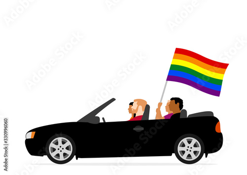 People in car with lgbt flag