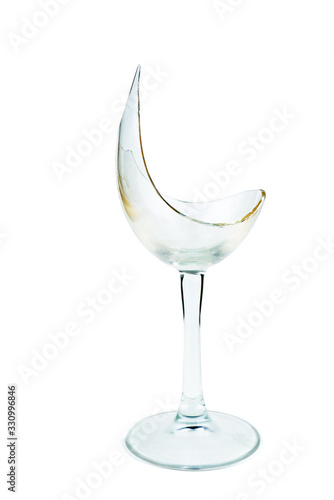 Shattered wineglasses isolated on white background photo