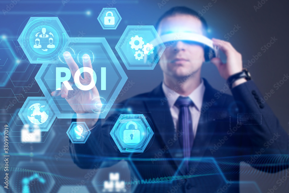 Obraz premium Business, Technology, Internet and network concept. Young businessman working on a virtual screen of the future and sees the inscription: