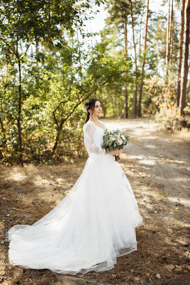 Attractive bride in the autumn forest Attractive bride in the autumn forest