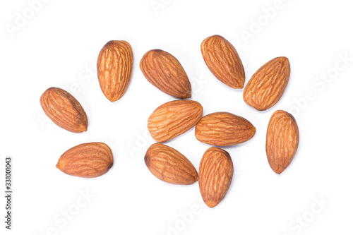Closeup almond nuts isolated on white background. Top view. Flat lay.