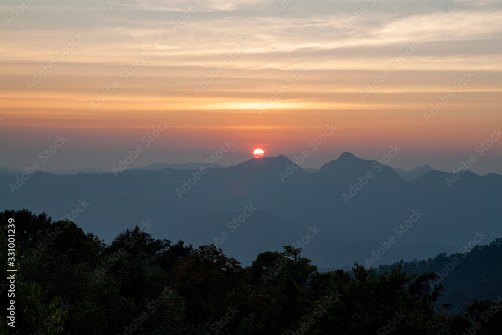 Fototapeta premium The sunset on mountain in national park at thailand