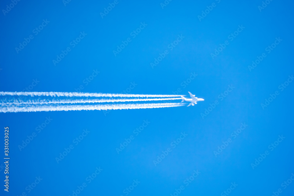 long trail of jet plane on blue sky. Aircraft on blue sky, Travel concept long trail of jet plane on blue sky. Aircraft on blue sky, Travel concept
