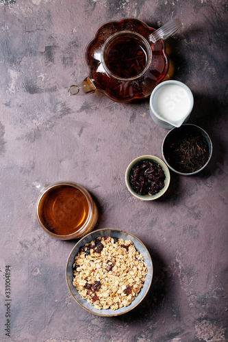 Granola breakfast in ceramic bowl