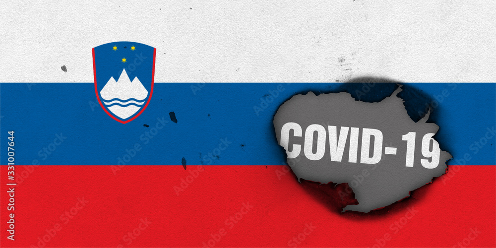 Flag of Slovenia with burned out hole showing Coronavirus name in it. 2019 - 2020 Novel Coronavirus (2019-nCoV) concept, for an outbreak occurs in Slovenia.