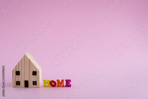 Wooden house model with HOM...