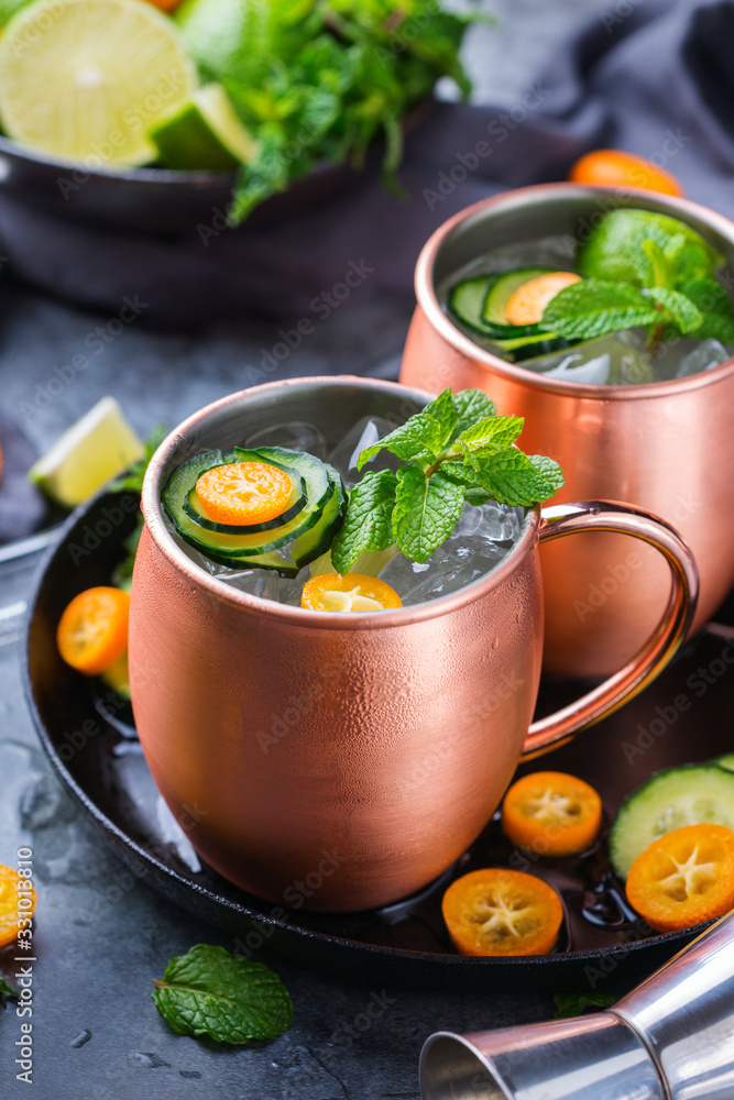 Moscow mule cocktail with lime, mint, cucumber and kumquat Moscow mule cocktail with lime, mint, cucumber and kumquat
