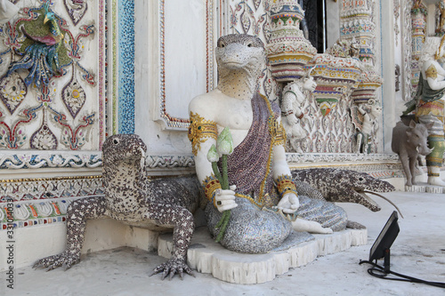 Detail, statue of Wat Pariwat (Beckham's temple) in Bangkok city, Thailand. Religious traditional national Thai architecture. Landmark, sight, architectural monument of Bangkok, Thailand. Asian temple