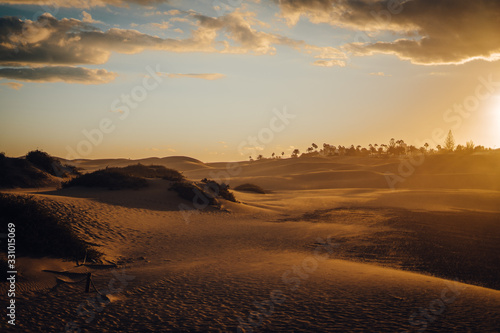 Maspalomas, Canary Islands. Desert dunes at sunset with very orange tones