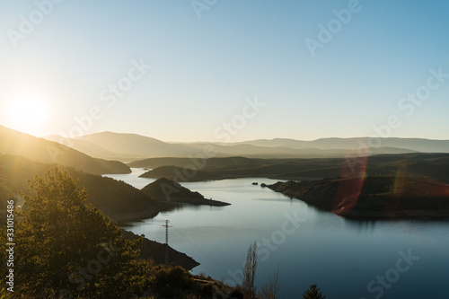 Beautiful view of El Atazar reservoir in Madrid, Spain at sunset
