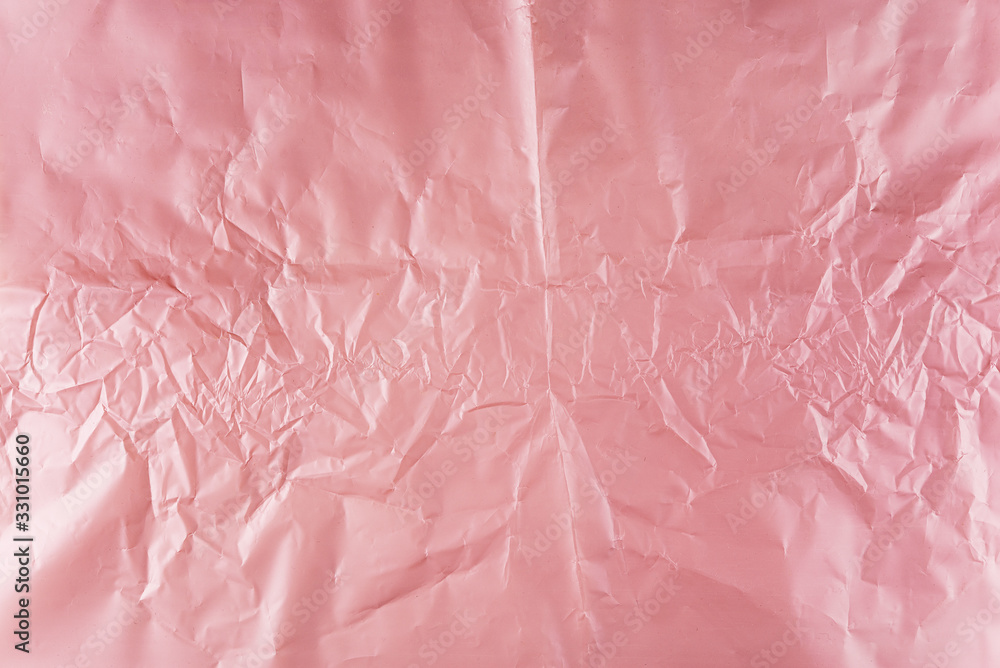 Crumpled pink gold and purple wrapping paper Crumpled pink gold and purple wrapping paper