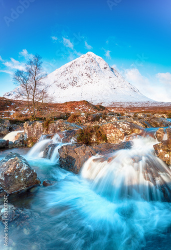 Cascading waterfall at Glen Etive with the Buachaille Etive Mor in the background