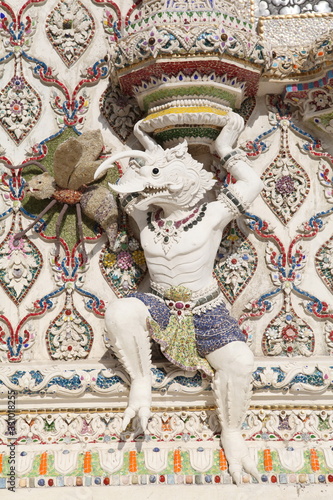 Detail, statue of Wat Pariwat (Beckham's temple) in Bangkok city, Thailand. Religious traditional national Thai architecture. Landmark, sight, architectural monument of Bangkok, Thailand. Asian temple photo