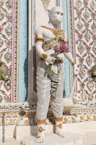 Detail, statue of Wat Pariwat (Beckham's temple) in Bangkok city, Thailand. Religious traditional national Thai architecture. Landmark, sight, architectural monument of Bangkok, Thailand. Asian temple photo