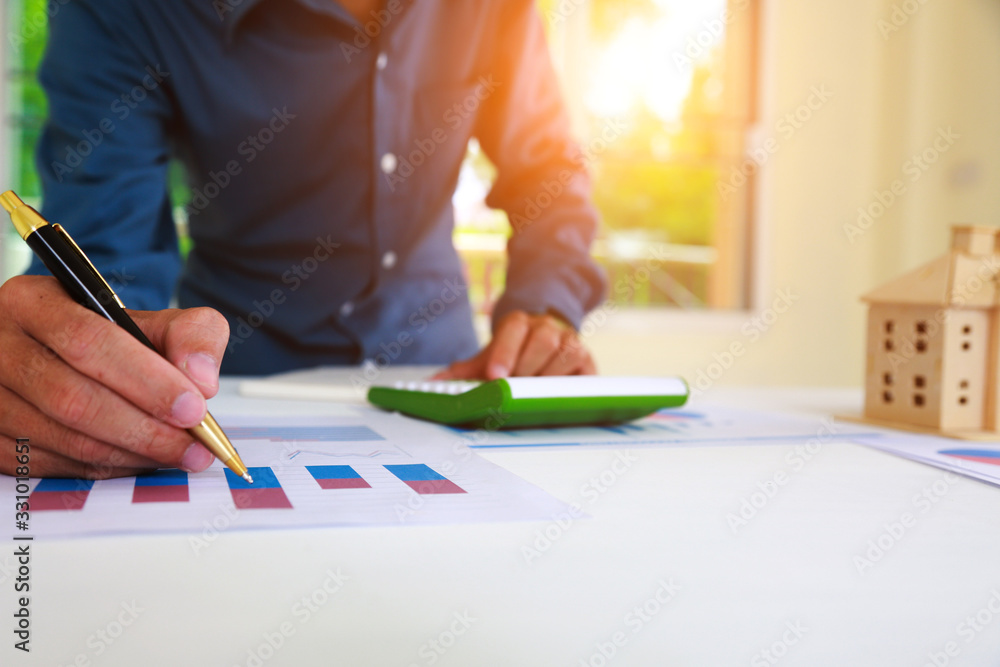 Businessmen are analyzing the cost curve for SME investment. Businessmen are analyzing the cost curve for SME investment.