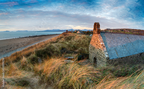 St Tanwg's church on the beach at Llandanwg photo