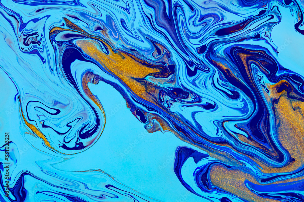 Fluid art texture. Abstract backdrop with swirling paint effect. Liquid acrylic artwork with trendy mixed paints. Can be used for website background. Blue, golden and cyan overflowing colors