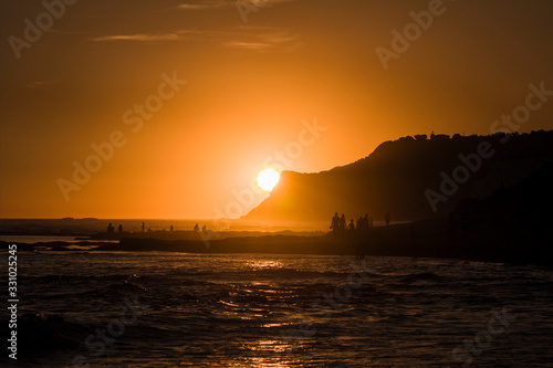 Sunset in a beach in Italy