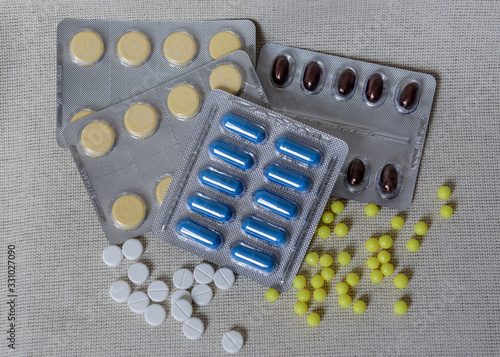 Konstfotografi Different tablets in packaging and without