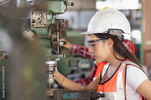 Industry worker engineer production factory safety mechanic, factory machinery, Engineers and workers Controlling machinery in industrial plants in production, in the operation must consider safety.