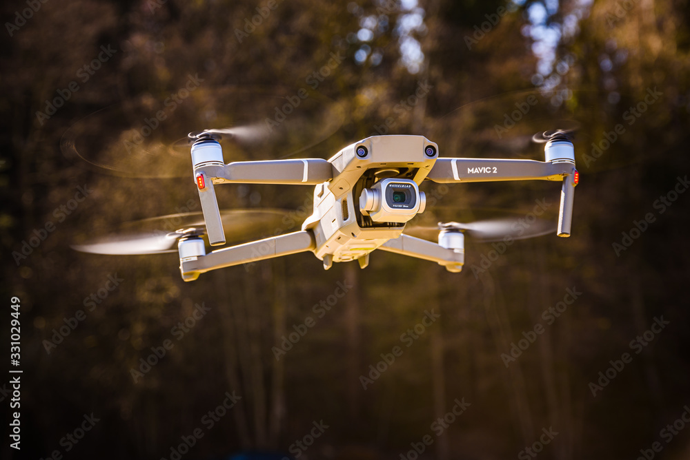 DJI Drone Mavic 2 Pro flying in rural area. Stock Photo | Adobe Stock