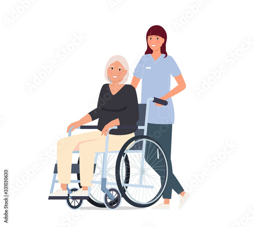 Caring for the elderly. A nurse is taking her grandmother in a wheelchair.