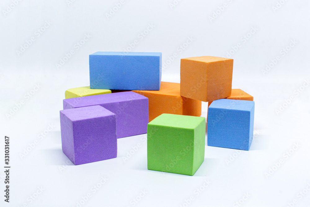 colorful kids toy in lightbox on white background colorful kids toy in lightbox on white background