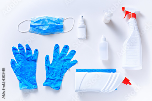 Top view of protective disinfection set, isolated on top of white background.