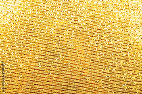 Abstract background texture of golden glitter photo