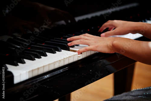 A woman playing the piano
