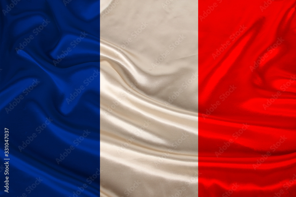 photo of the national flag of France on a luxurious texture of satin, silk with waves, folds and highlights, closeup, copy space, concept of travel, economy and state policy, illustration