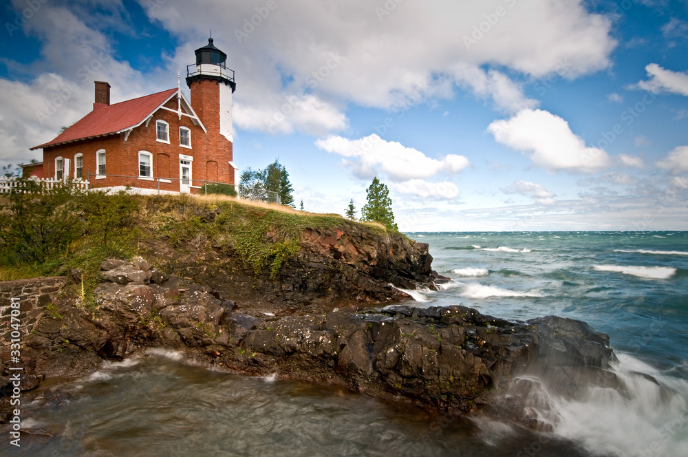 Gale force winds on Lake Superior produce crashing waves at Michigan's Eagle Harbor Lighthouse.