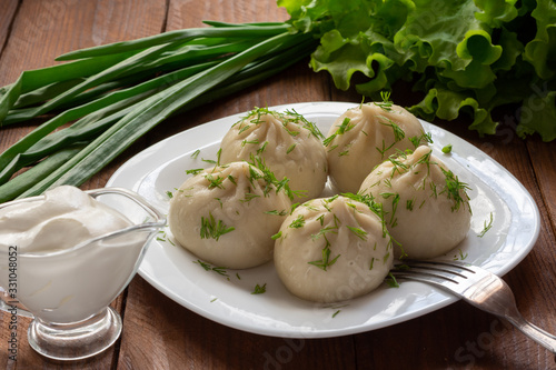 Khinkali with meat. The Georgian dumplings. Still-life.