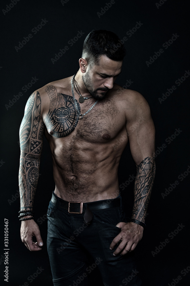 Beautiful male torso. Men tattoo casual fashion. muscular bodybuilder  posing. sexy portrait of sport man. Tattooed muscular guy posing in studio.  Workout for good health. Prank to abdominal muscles Stock Photo |